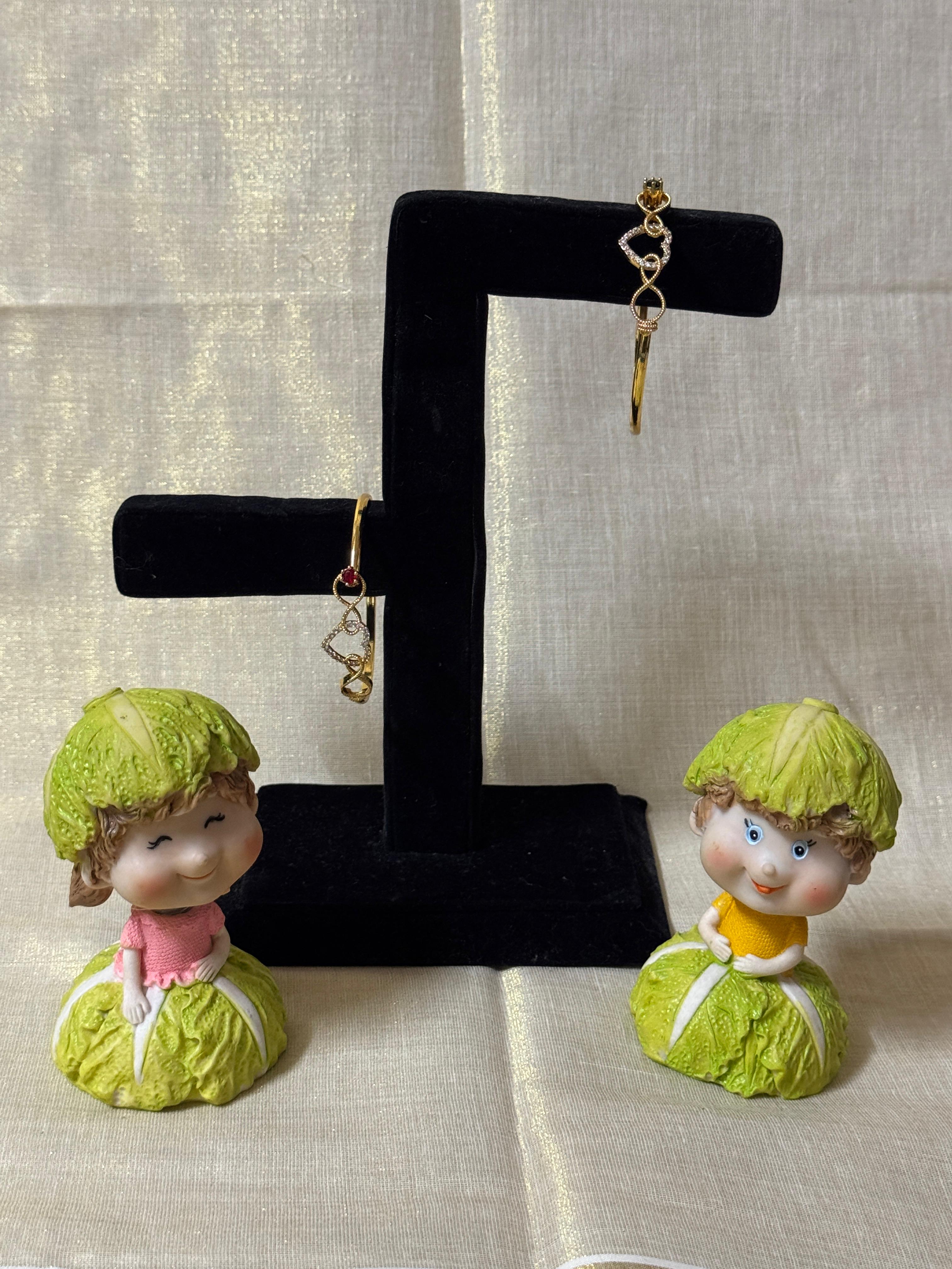 FREE SIZE WHITE AND RUBY STONE BANGLES