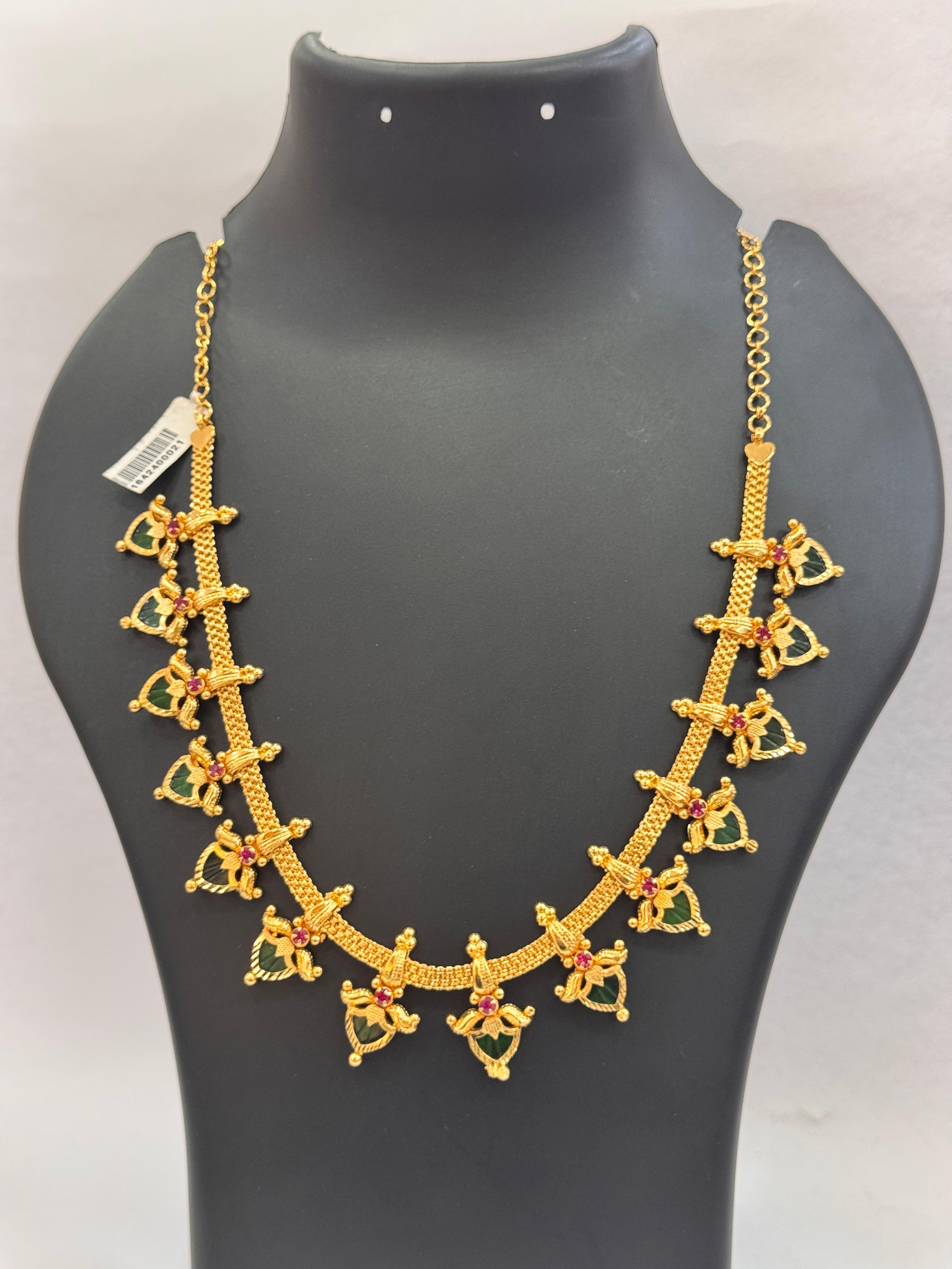 GOLD PLATED NECKLACE WITH LEAF AND STONE DESIGN
