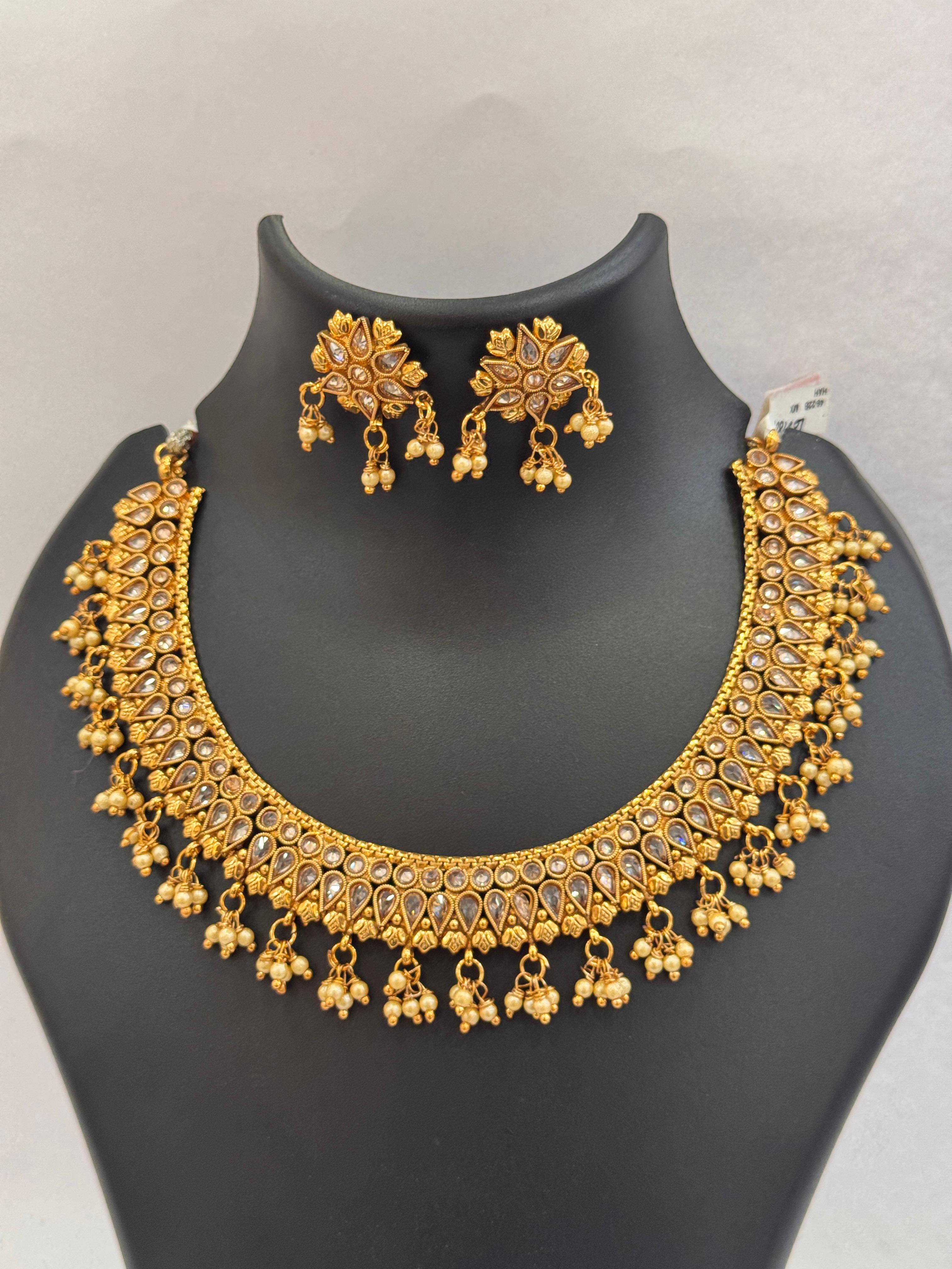 ANTIQUE GOLD PLATED NECLKACE WITH REARDROP STONE WORK AND EARRINGS