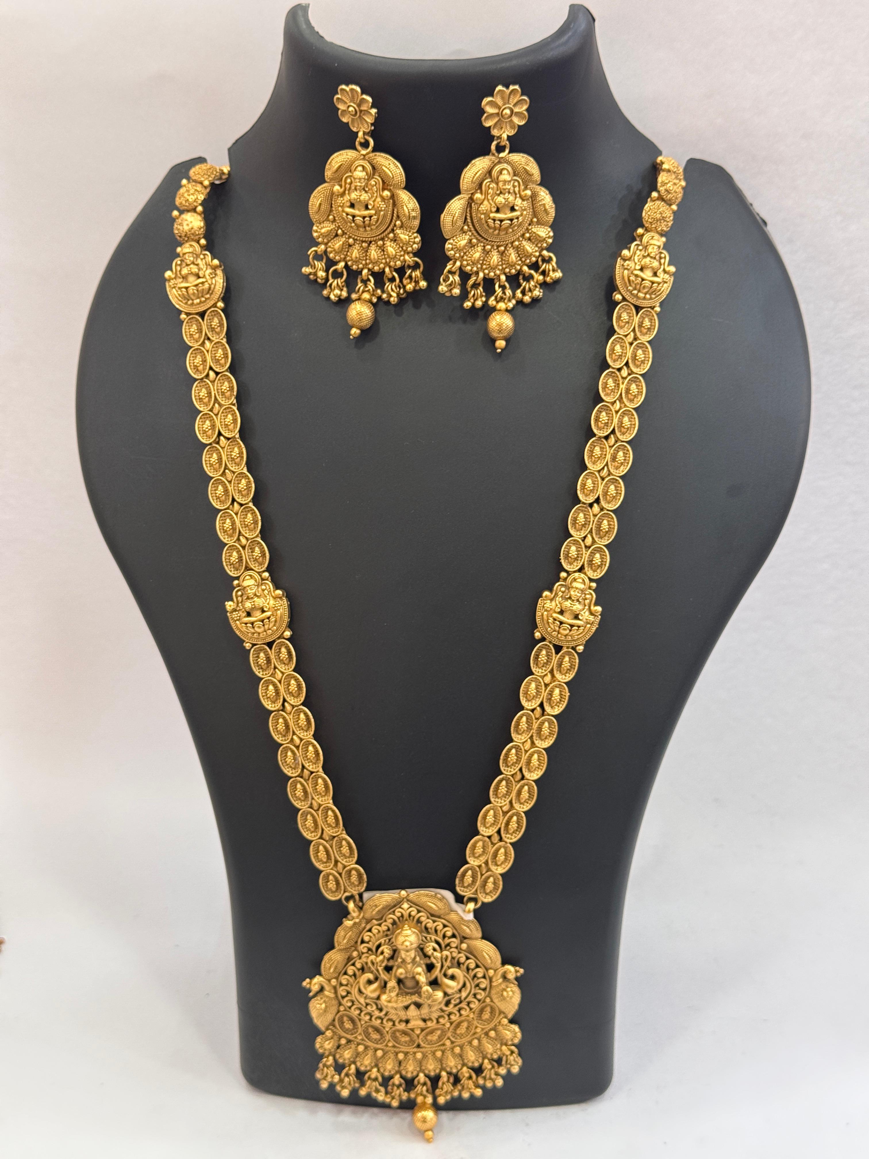 ANTIQUE GOLD PLATED LAKSHMI LONG HARAM WITH EARRINGS